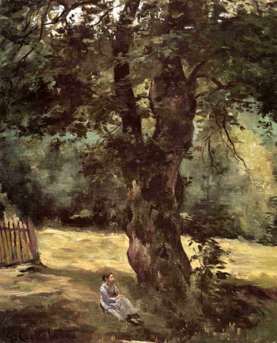 木の下に座る女性