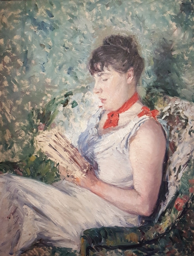 座って本を読む女性の肖像